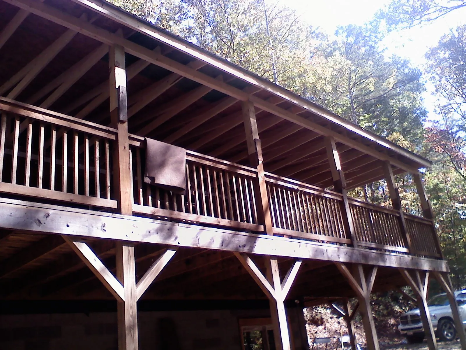 Timber framing under a new elevated porch and deck — Roof Leak Repair in Center Point by Roofing Brothers